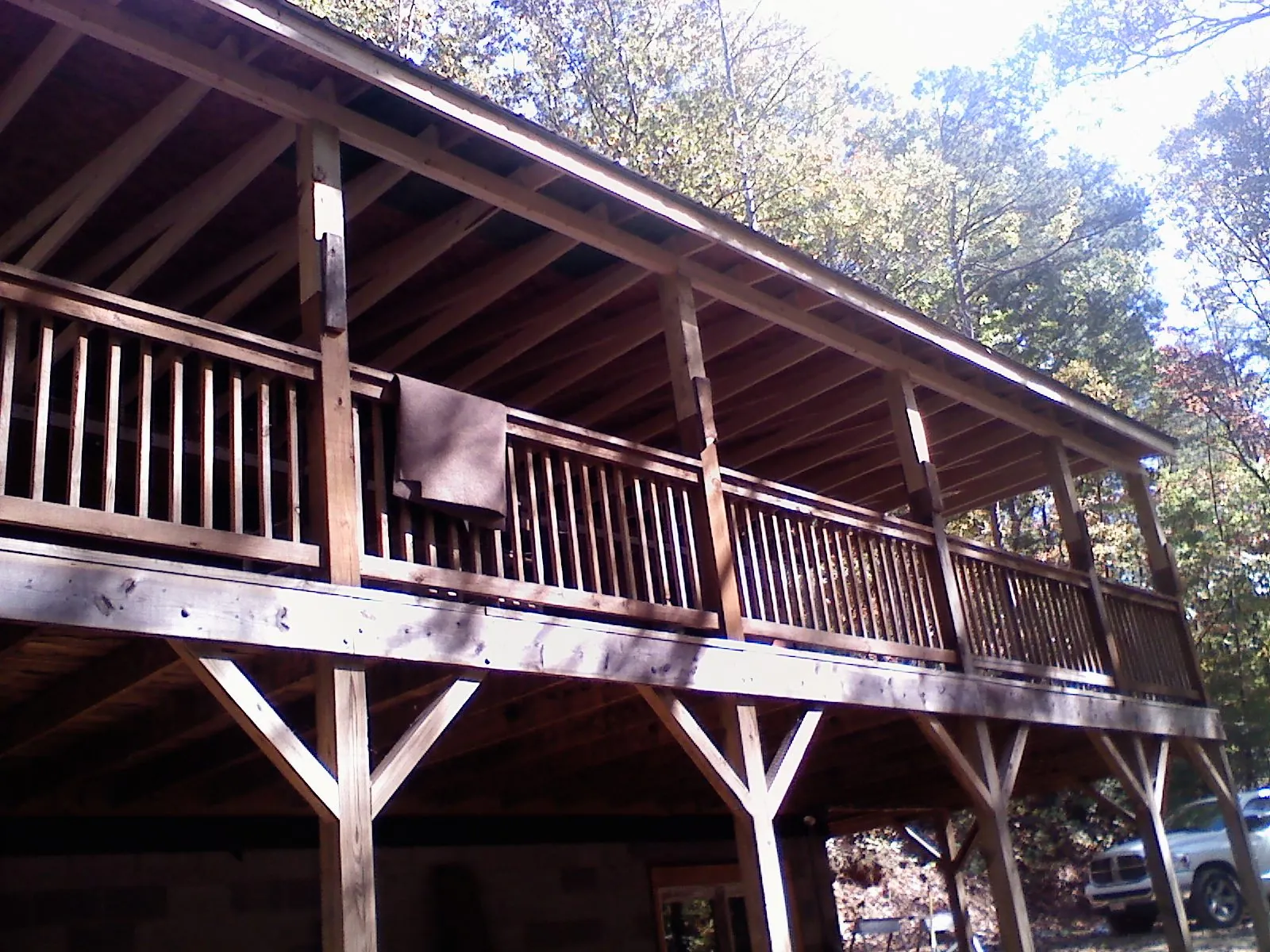 Timber framing under a new elevated porch and deck — Roof Leak Repair in Cache by Roofing Brothers